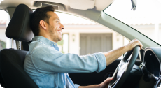 Man Driving a Car