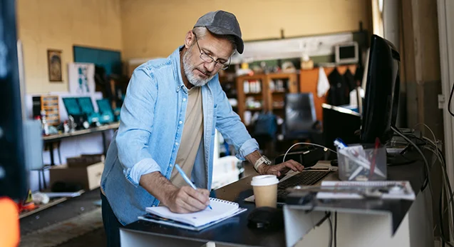 Business owner working in shop
