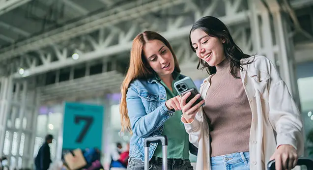 Member at airport setting up Travel Notification in digital banking